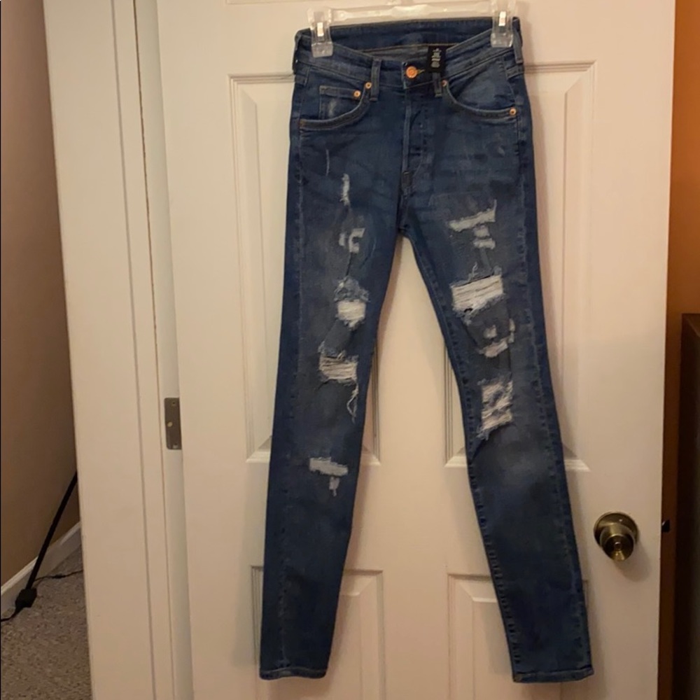Young men’s ripped denim jeans “like new”